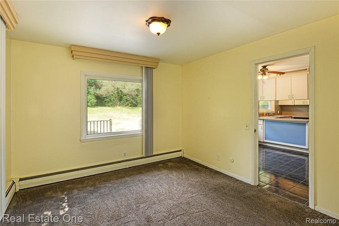 9780 Mcgregor Road Pinckney, MI 48169 - Photo 6 of 34 Walk through to kitchen