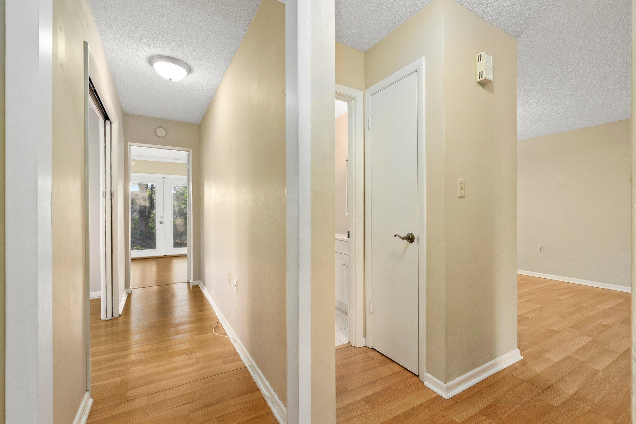 5901 Sunset Boulevard Fort Pierce, FL 34982 - Photo 18 of 26 a view of a hallway with wooden floor
