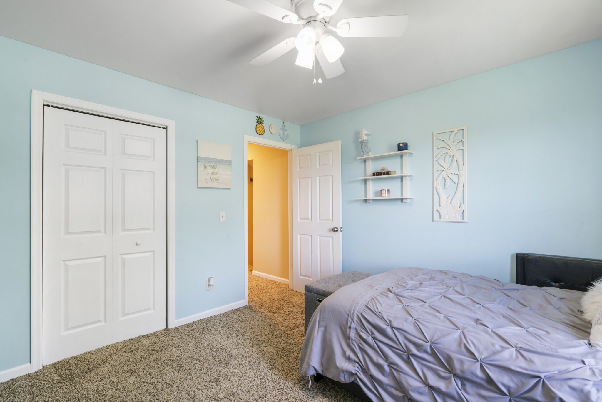 5795 Clear Creek Road Pulaski, TN 38478 - Photo 14 of 25 a bedroom with a bed and a chandelier