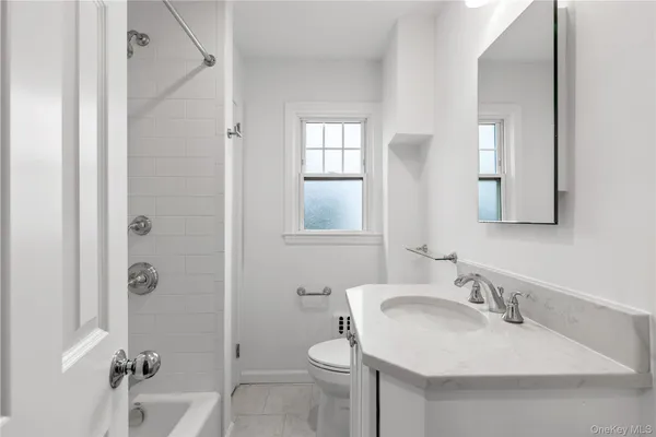a kitchen with a washer and dryer in it