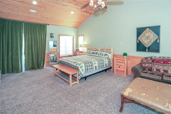a view of a snow on the roof of a yard