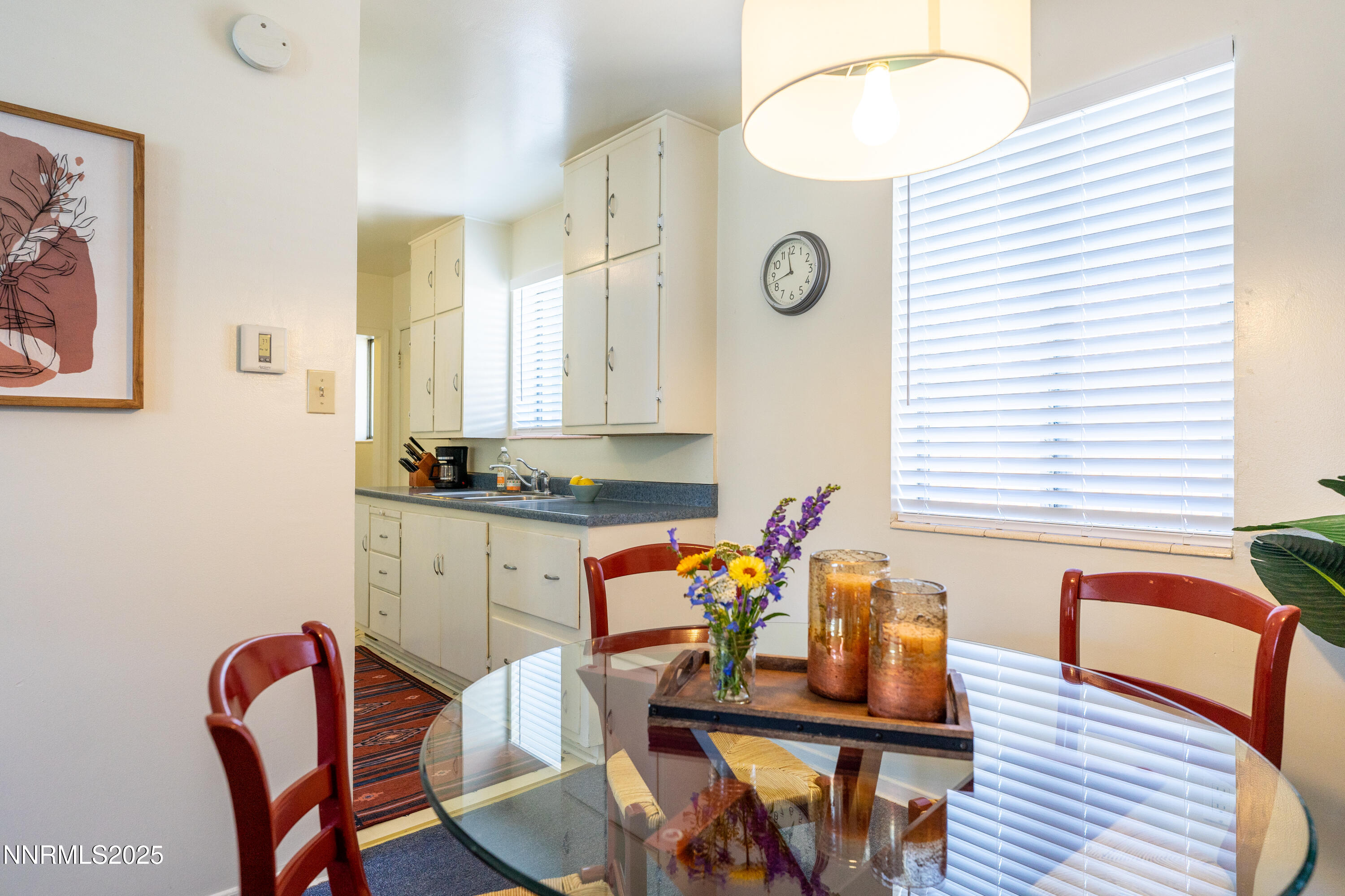 154 East Arroyo Street Reno, NV 89502 - Photo 20 of 36 a dining room with furniture and wooden floor