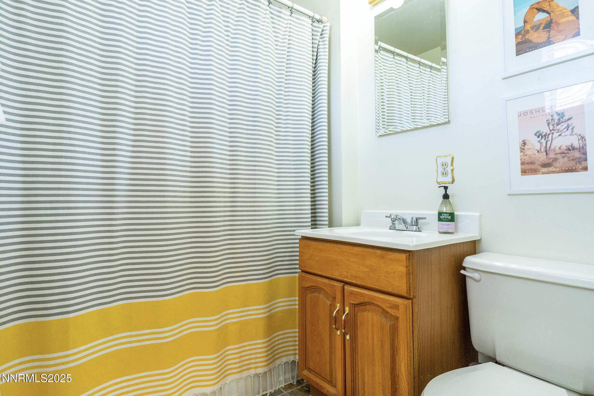 154 East Arroyo Street Reno, NV 89502 - Photo 23 of 36 a bathroom with a sink and a toilet