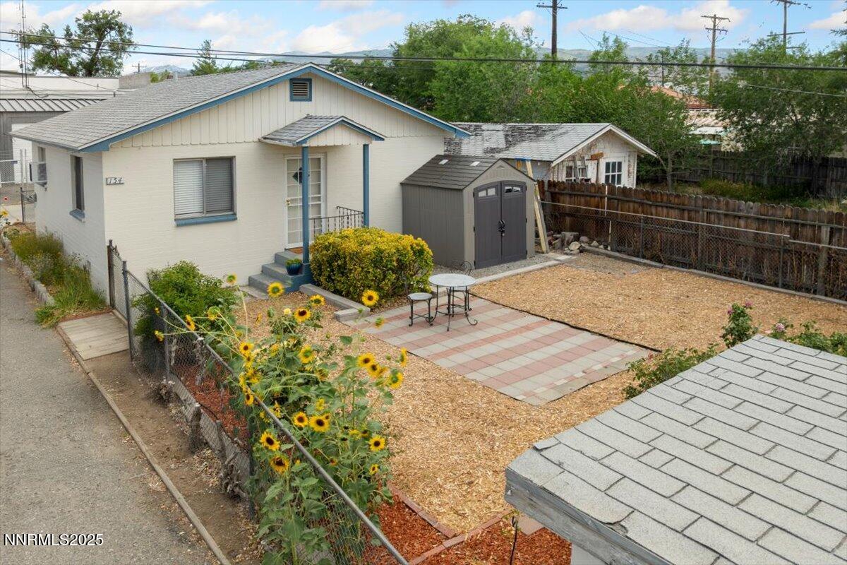 154 East Arroyo Street Reno, NV 89502 - Photo 25 of 36 a view of a house with wooden fence
