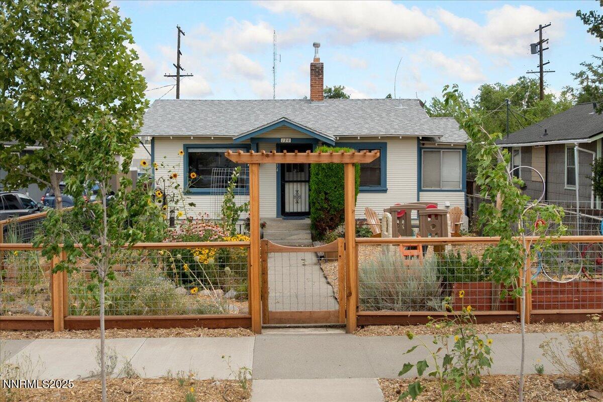 154 East Arroyo Street Reno, NV 89502 - Photo 26 of 36 a front view of a house with garden