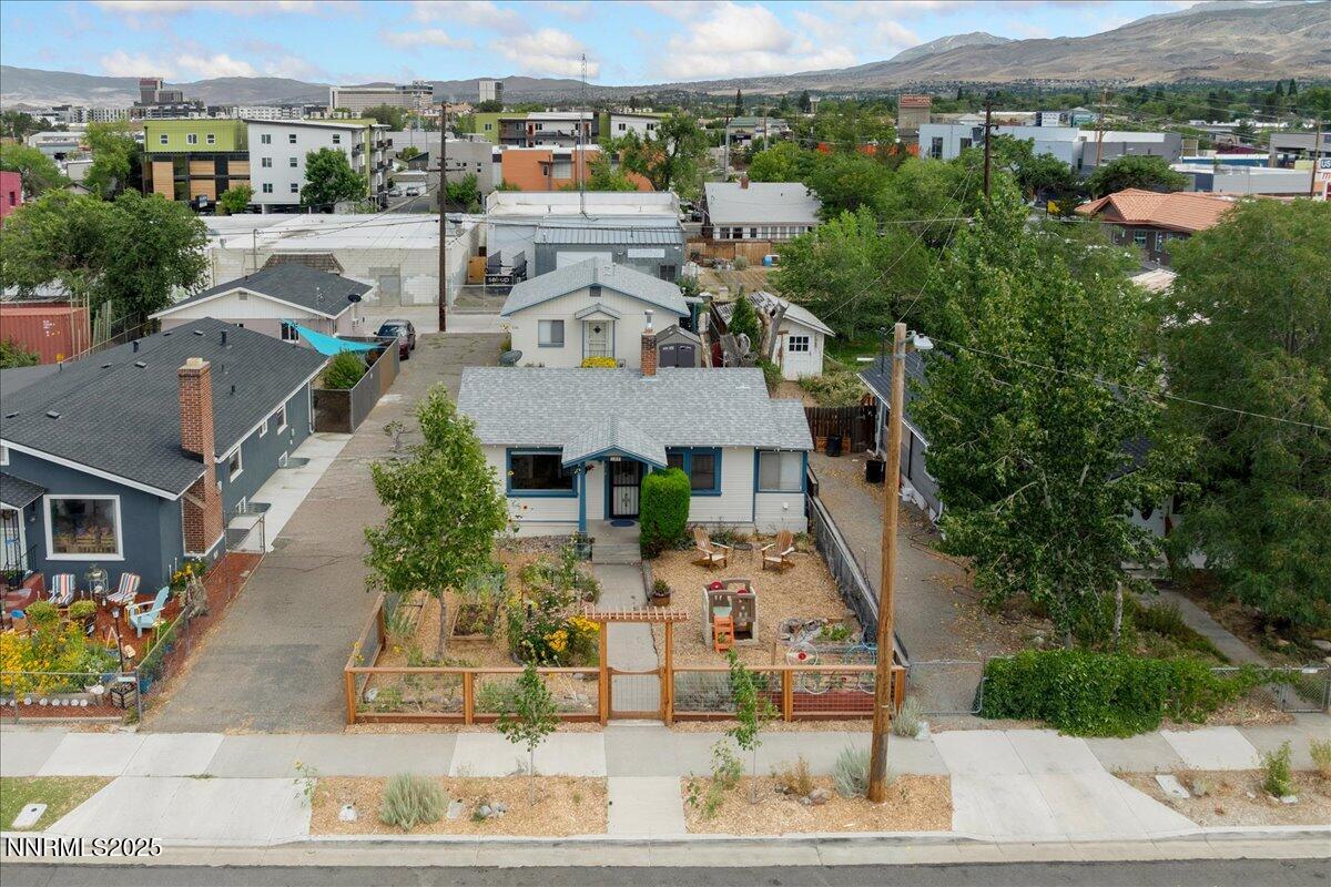 154 East Arroyo Street Reno, NV 89502 - Photo 29 of 36 an aerial view of a house with yard garage and lake view