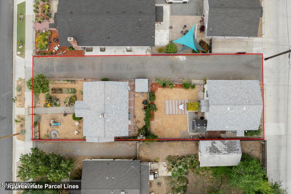 154 East Arroyo Street Reno, NV 89502 - Photo 31 of 36 an aerial view of residential houses with outdoor space and street view