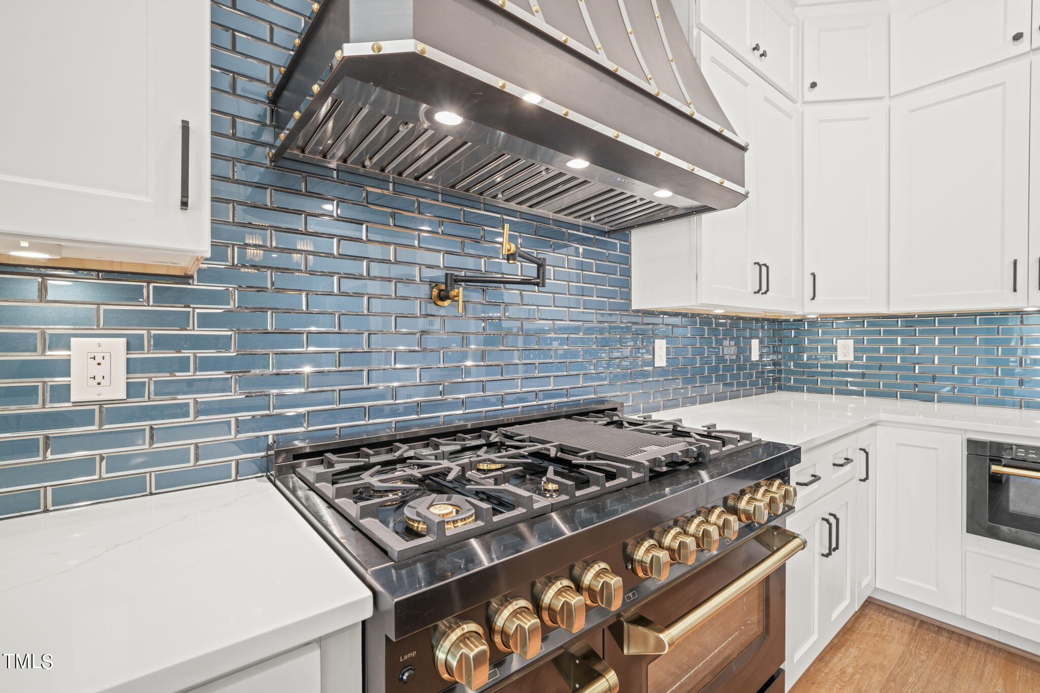 109 November Drive Durham, NC 27712 - Photo 13 of 57 a stove top oven sitting inside of a kitchen