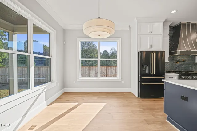 a kitchen with granite countertop a sink and a stove