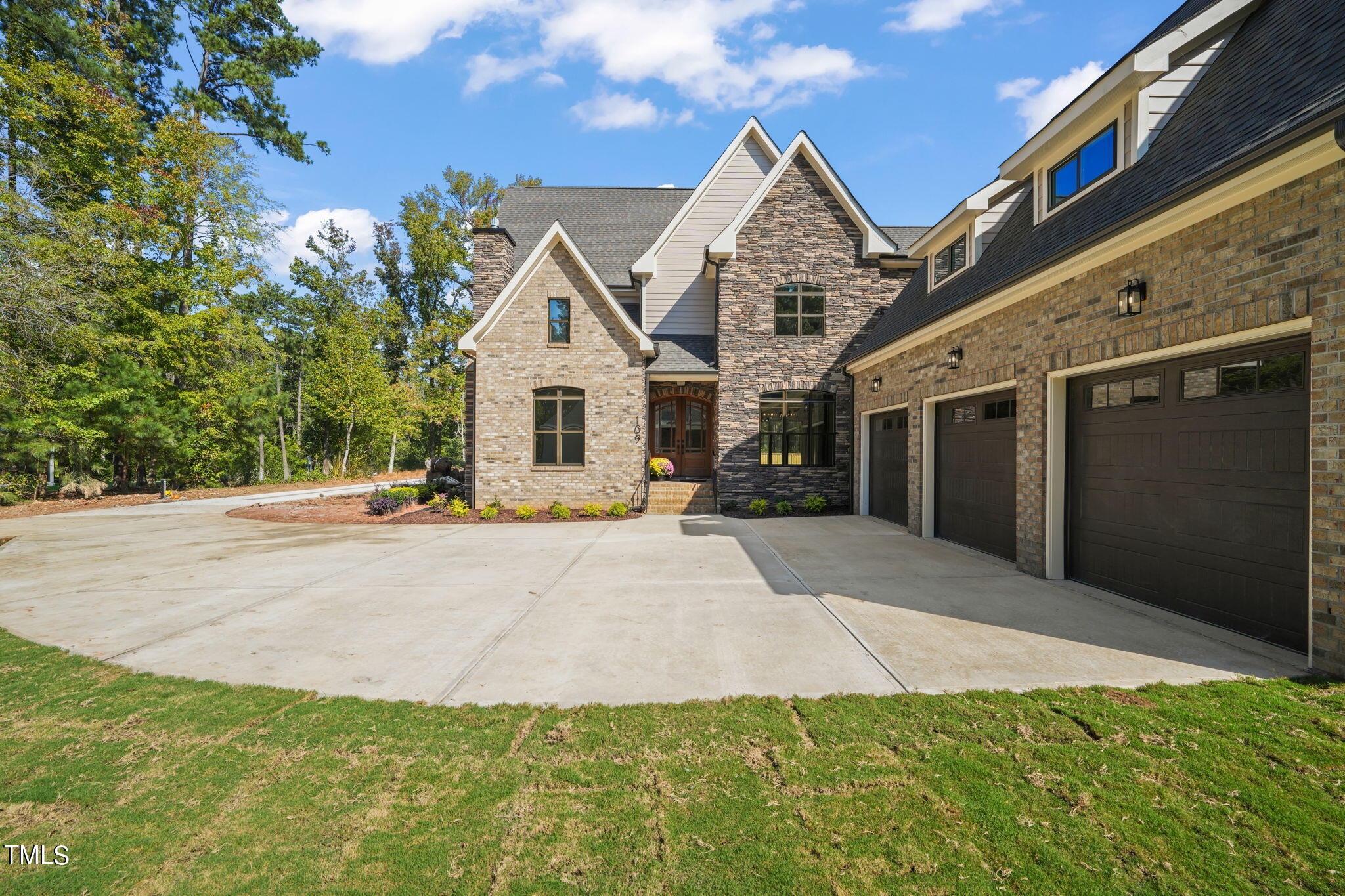 109 November Drive Durham, NC 27712 - Photo 2 of 57 a view of a house with backyard and porch