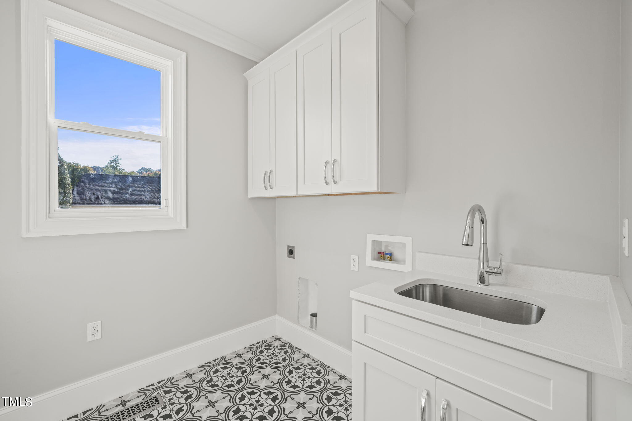 109 November Drive Durham, NC 27712 - Photo 23 of 57 a close view of a sink and cabinets