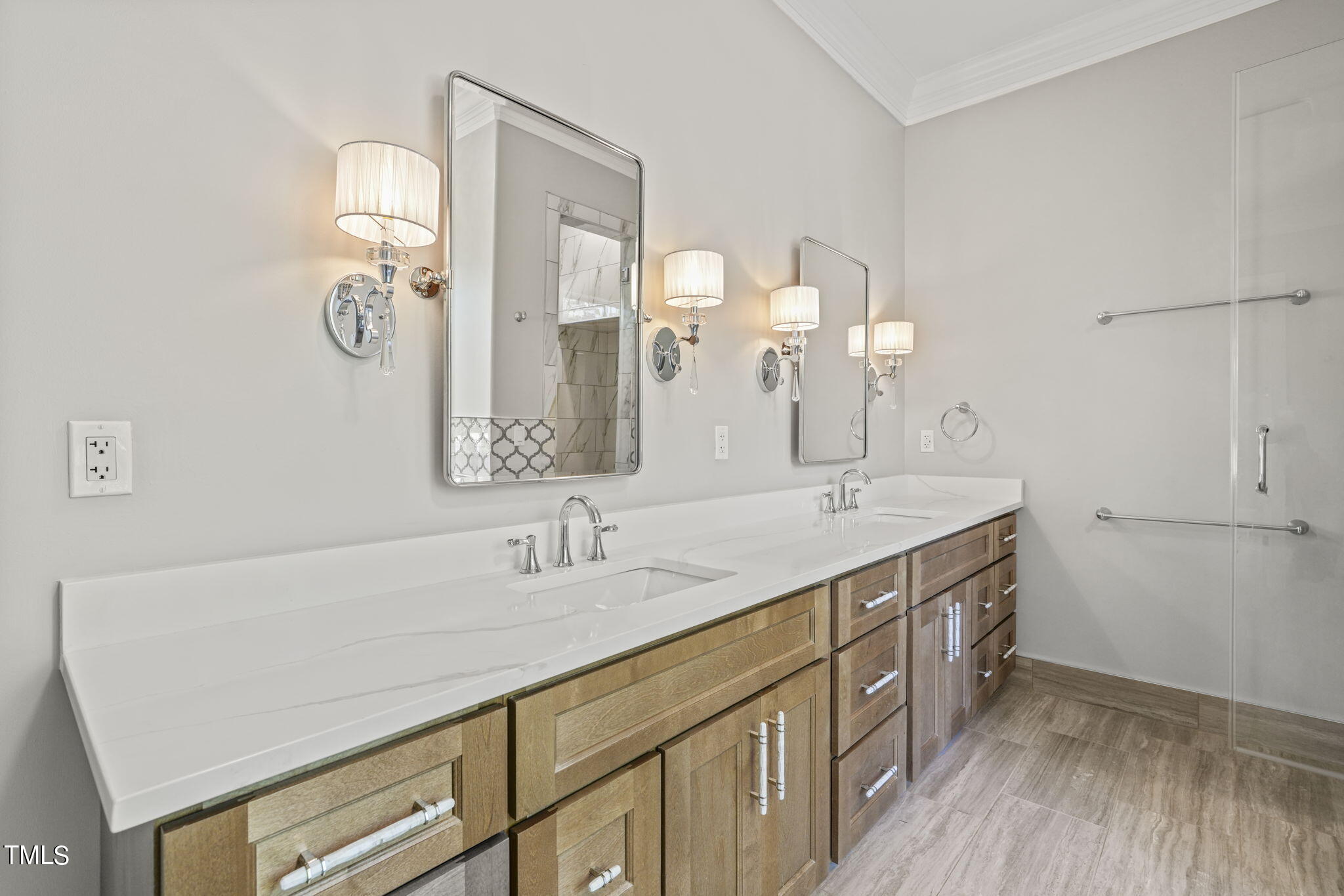 109 November Drive Durham, NC 27712 - Photo 29 of 57 a bathroom with a double vanity sink and a mirror