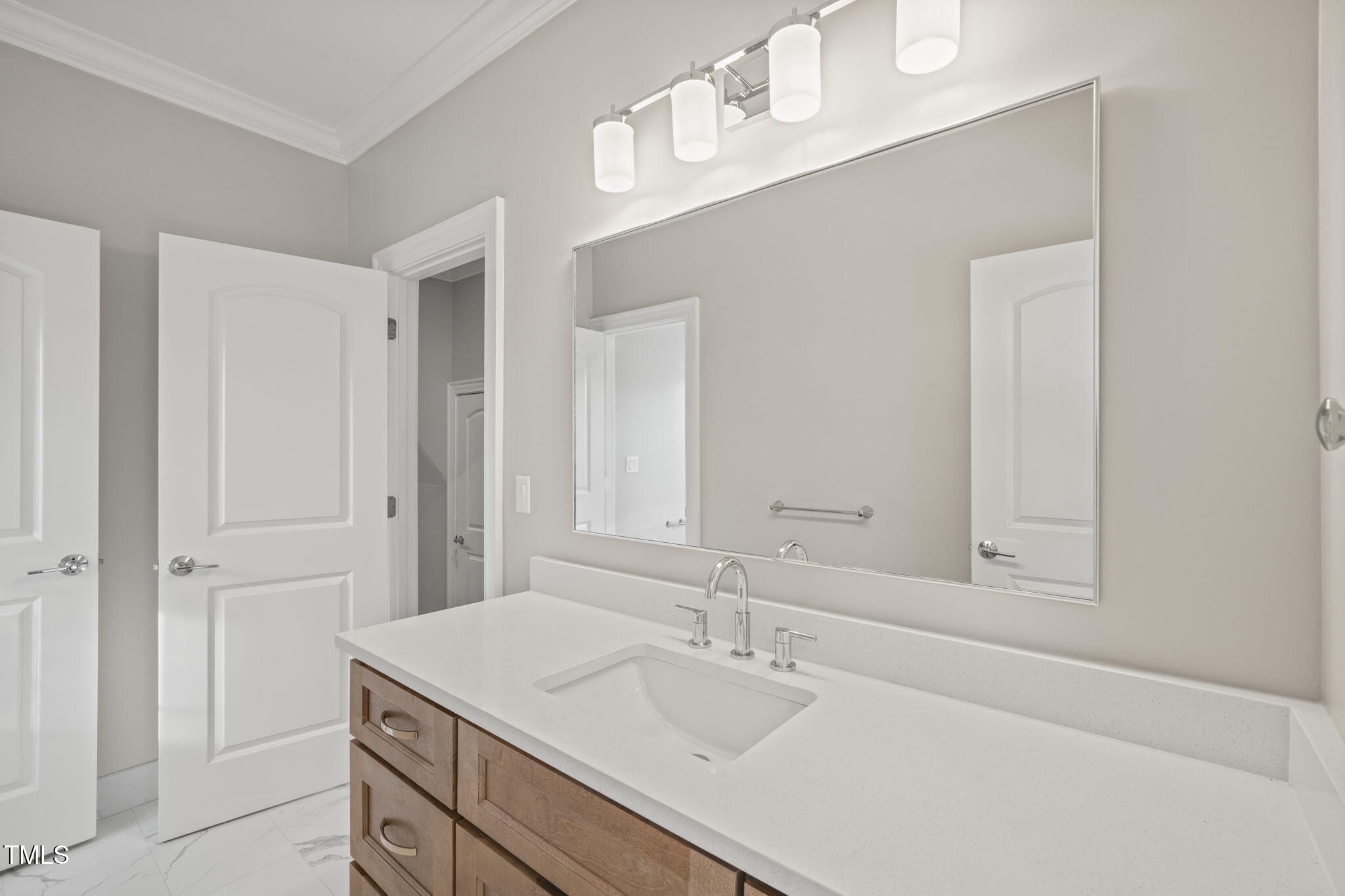 109 November Drive Durham, NC 27712 - Photo 41 of 57 a bathroom with a sink vanity and mirror
