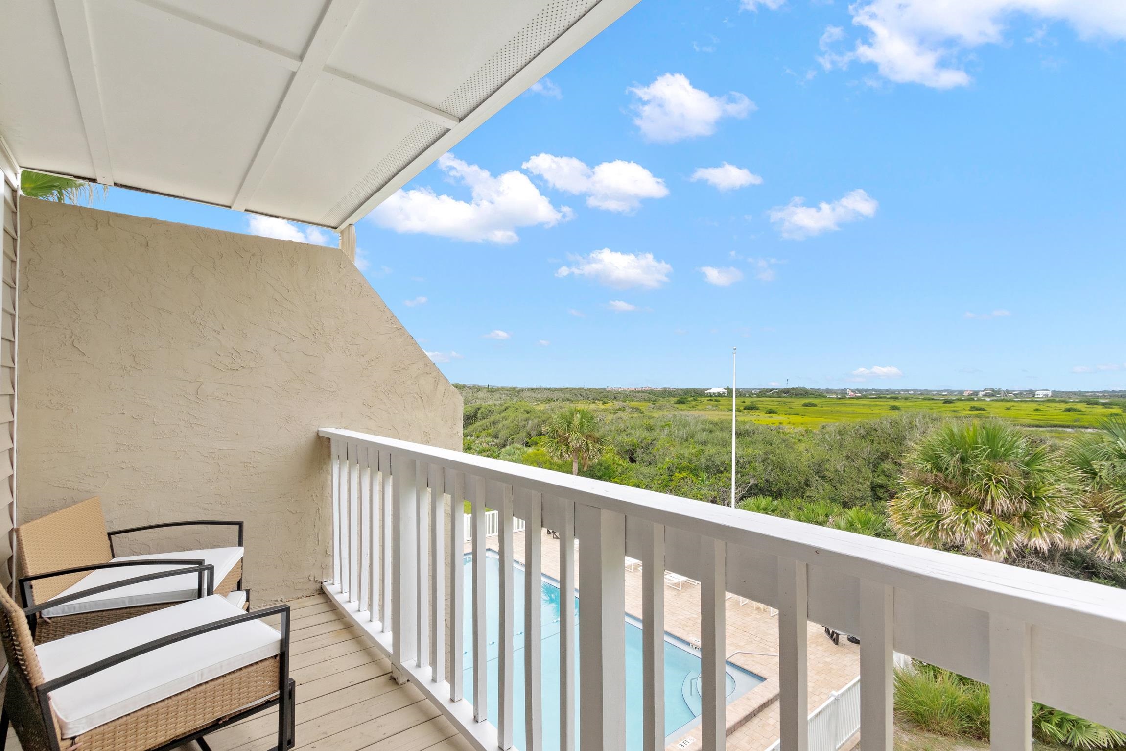 3385 Coastal Highway, Unit 22 St. Augustine, FL 32084 - Photo 23 of 35 a view of a balcony with an outdoor space