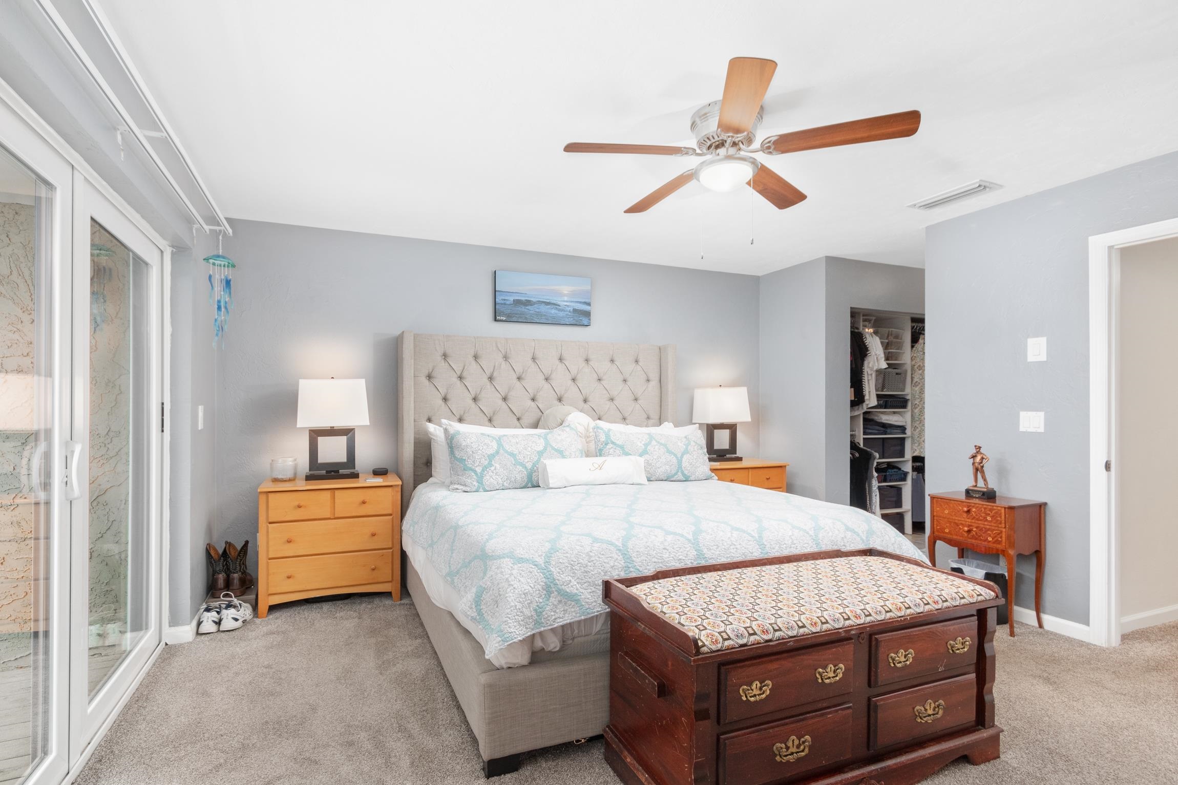 3385 Coastal Highway, Unit 22 St. Augustine, FL 32084 - Photo 24 of 35 a bed room with a bed and a ceiling fan