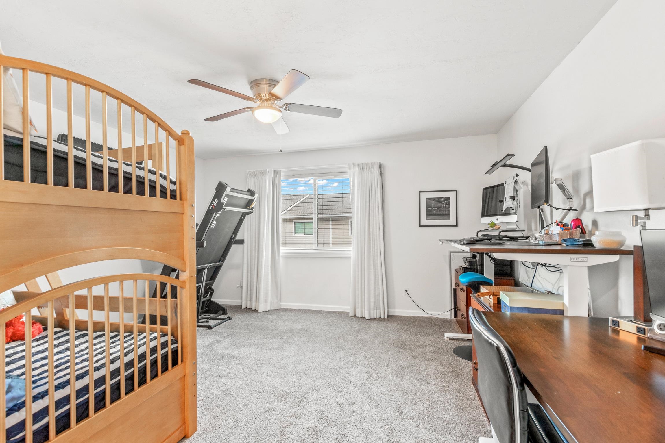 3385 Coastal Highway, Unit 22 St. Augustine, FL 32084 - Photo 29 of 35 a living room with furniture and a flat screen tv