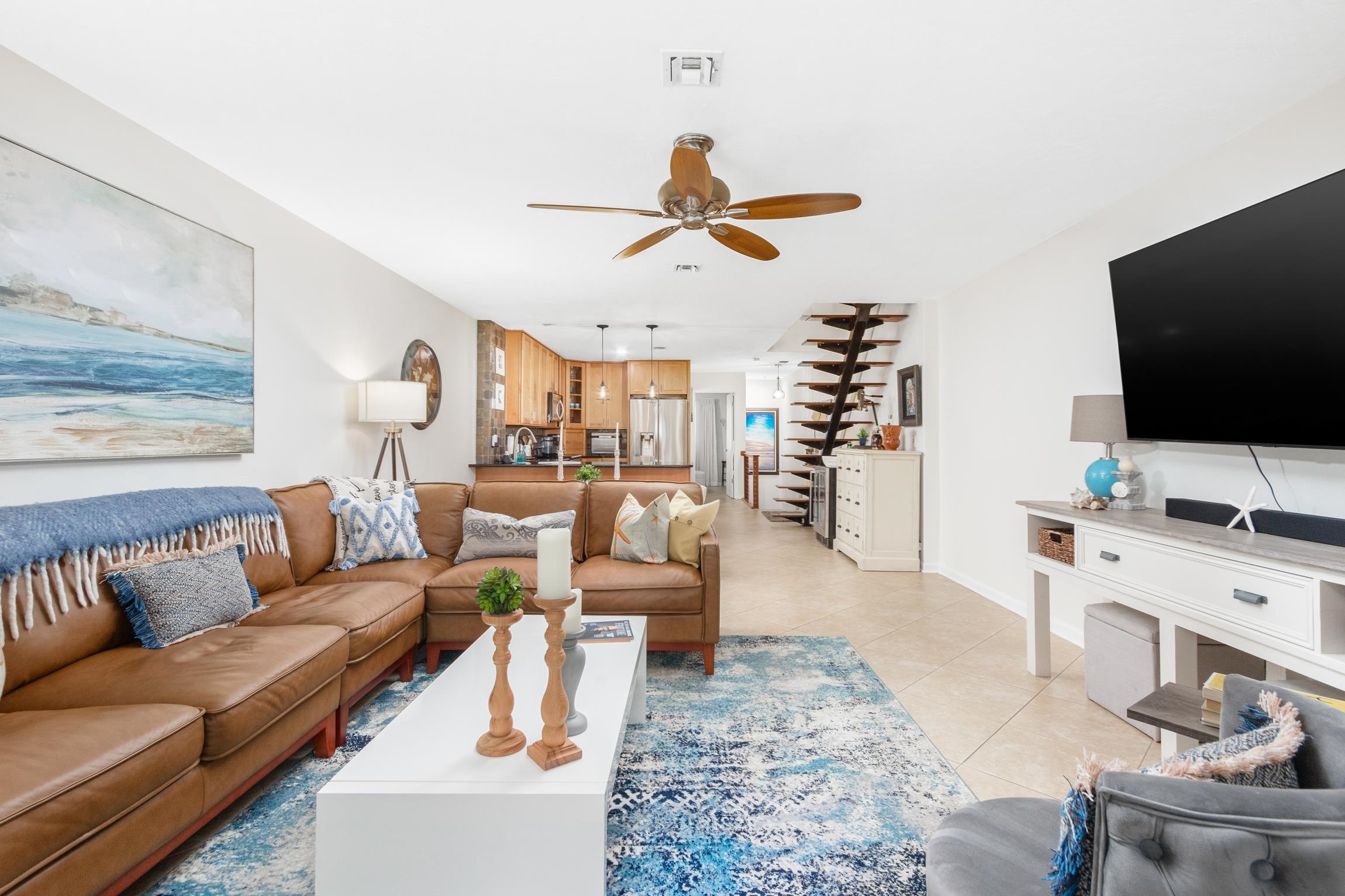 3385 Coastal Highway, Unit 22 St. Augustine, FL 32084 - Photo 6 of 35 a living room with furniture and a flat screen tv