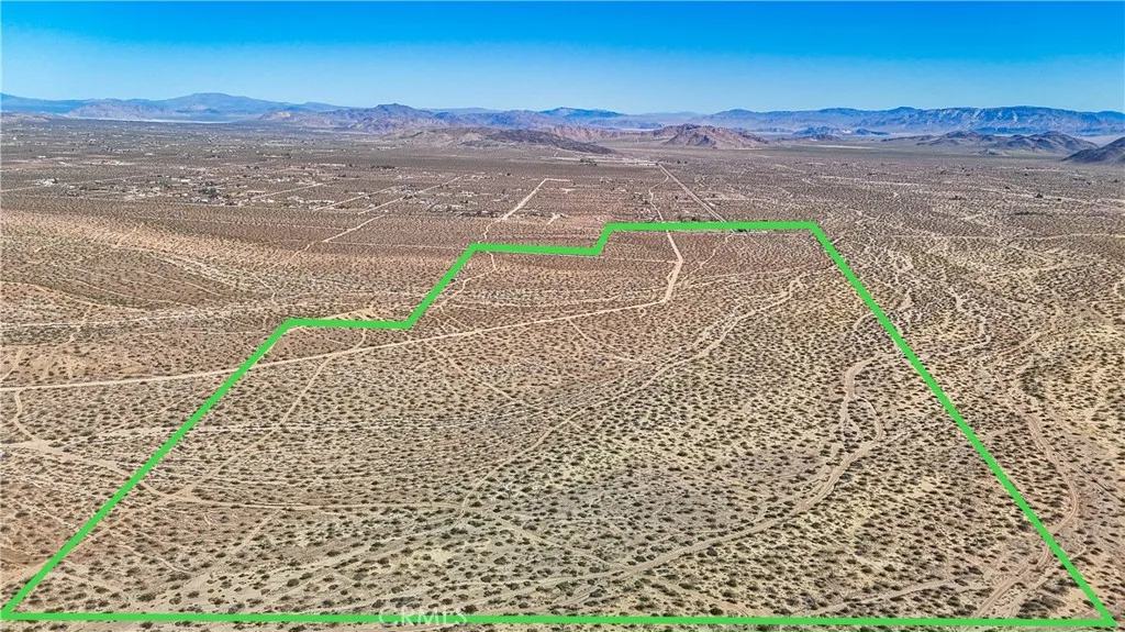 57645 Reche Landers, CA 92285 - Photo 9 of 38 a view of a yard with an outdoor space