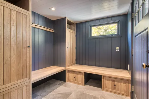 a bathroom with a double vanity sink and a bathtub