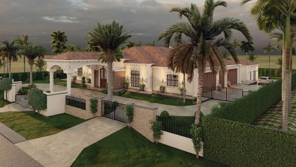 a front view of multiple houses with yard