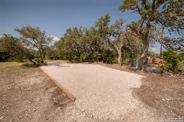 a view of empty space and trees