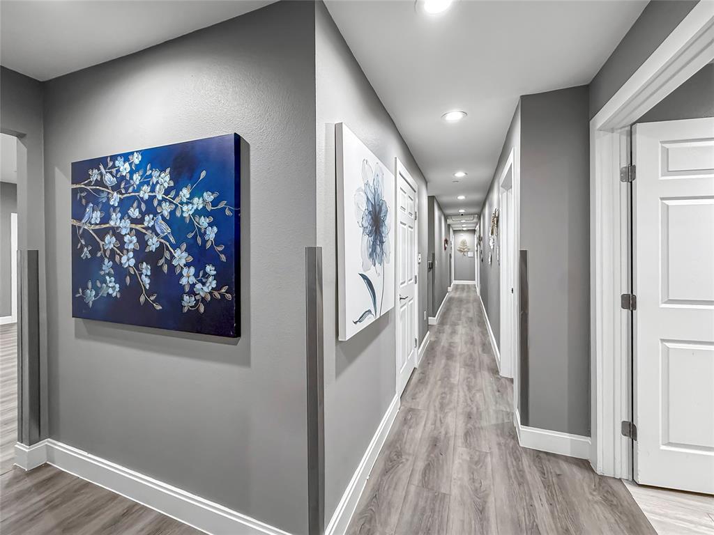 2402 Country Valley Road Garland, TX 75041 - Photo 11 of 39 a view of gallery with wooden floor