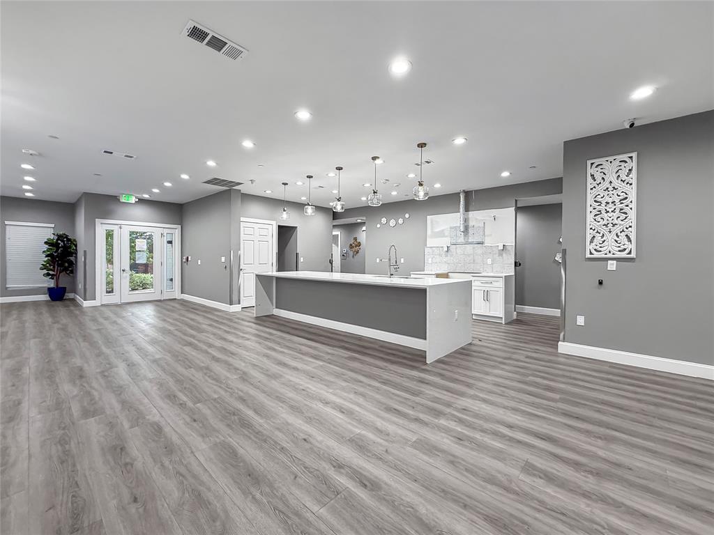 2402 Country Valley Road Garland, TX 75041 - Photo 16 of 39 a view of kitchen with kitchen island and stainless steel appliances