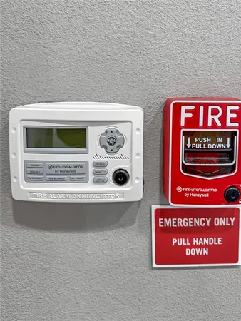a view of front door with washer and dryer