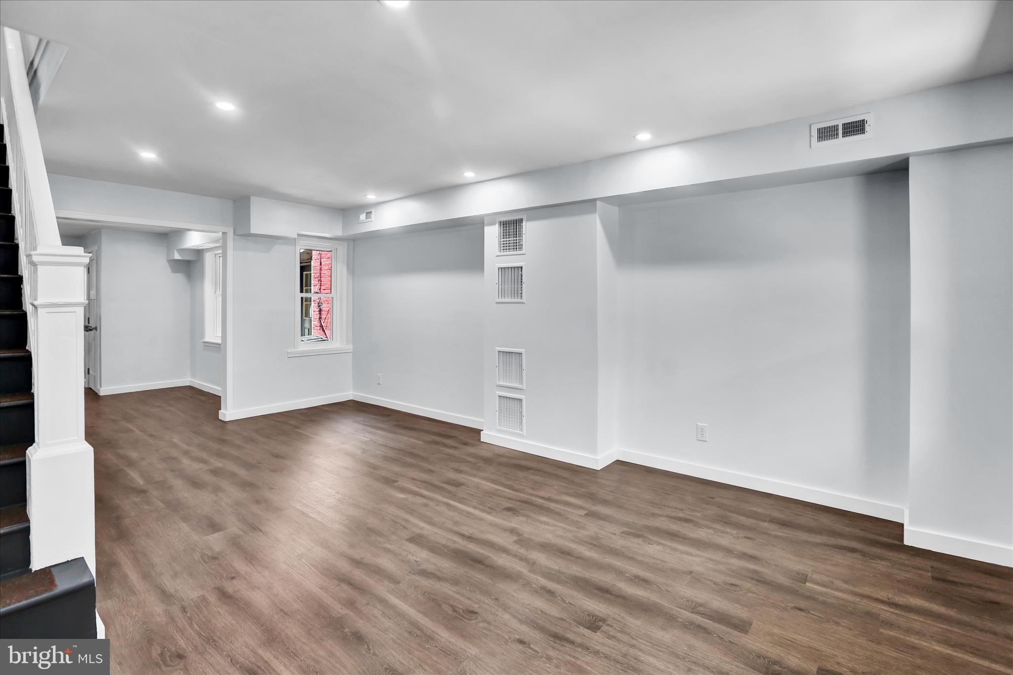 513 Manor Street Lancaster, PA 17603 - Photo 3 of 37 a view of empty room with wooden floor