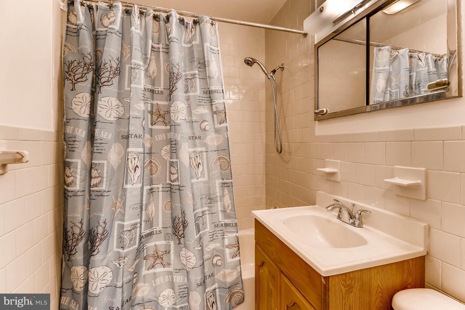 2008 Hanson Road Edgewood, MD 21040 - Photo 25 of 28 a bathroom with a sink and a mirror