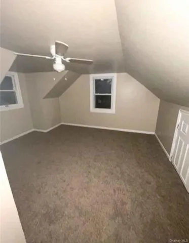 a kitchen with a refrigerator and a sink