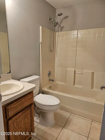 a bathroom with a sink a toilet and a bathtub