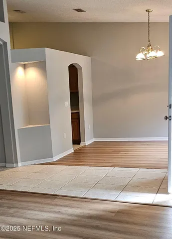 a view of a livingroom with a chandelier