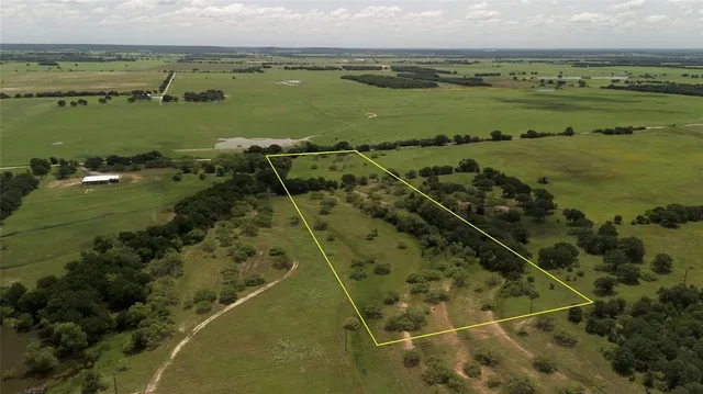 an aerial view of beach and ocean