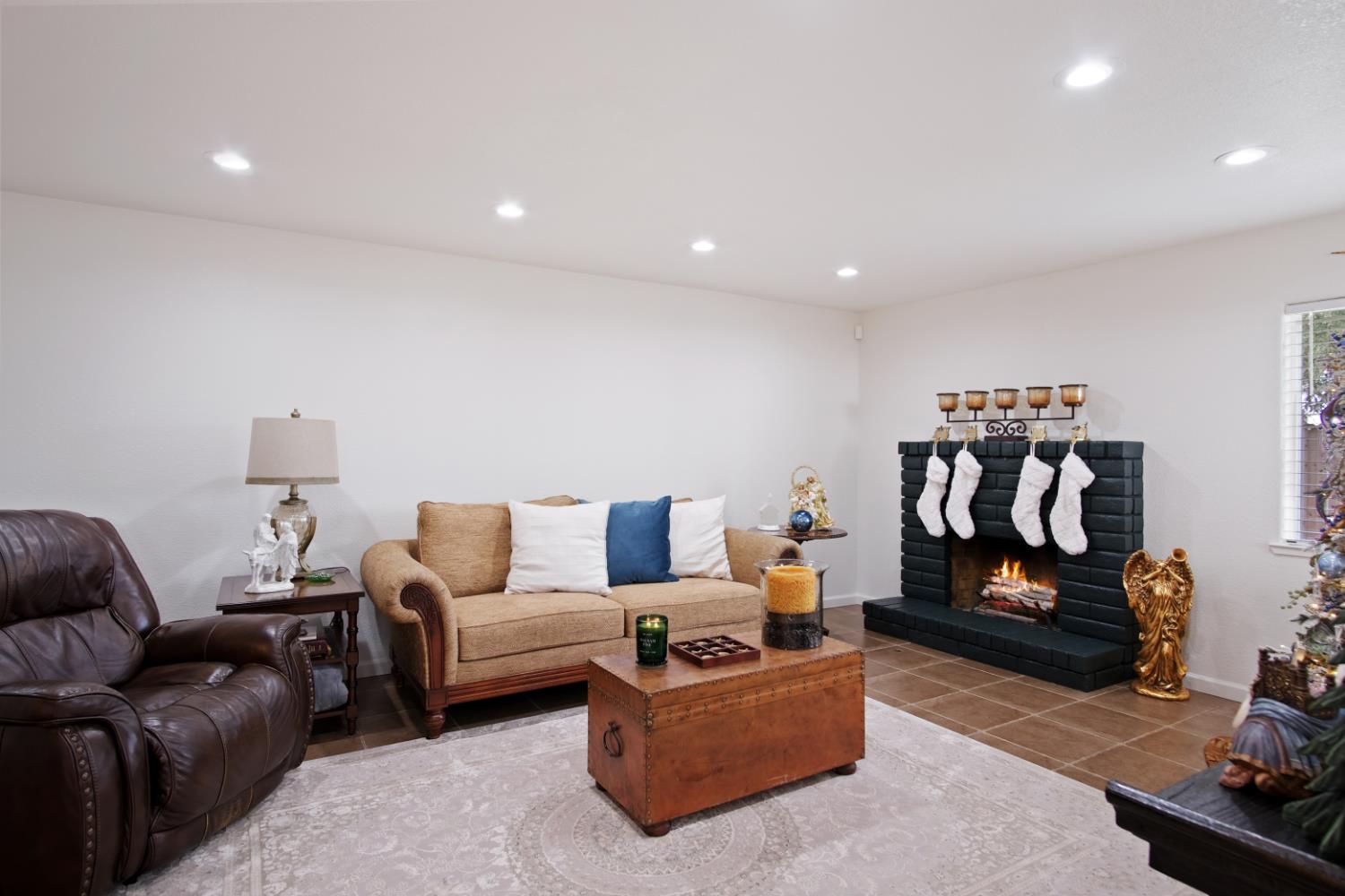 1921 Carleton Drive Turlock, CA 95382 - Photo 11 of 26 a living room with furniture a couch and a table