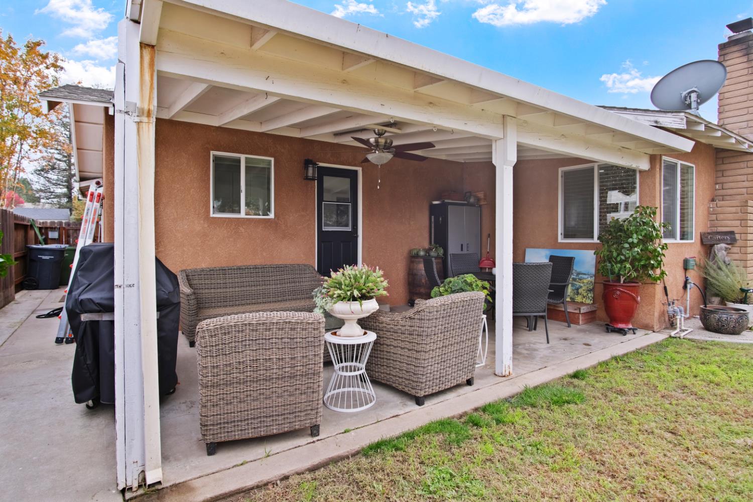 1921 Carleton Drive Turlock, CA 95382 - Photo 17 of 26 a view of house with patio outdoor seating