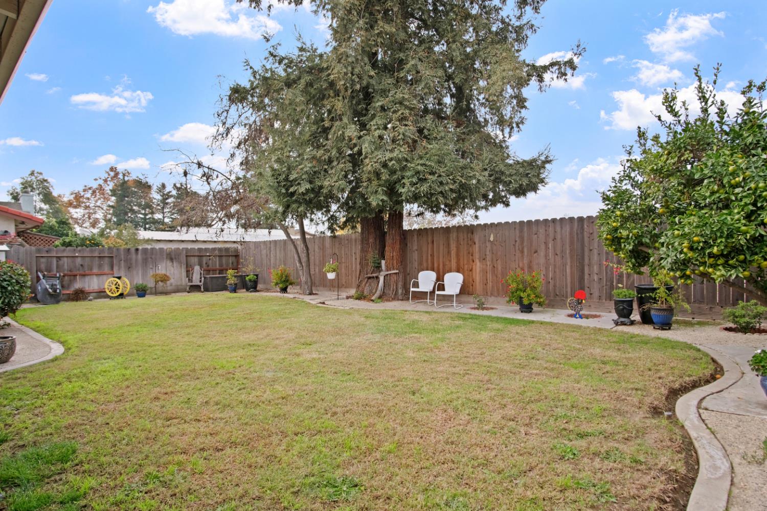 1921 Carleton Drive Turlock, CA 95382 - Photo 18 of 26 a view of a house with a yard and a garage