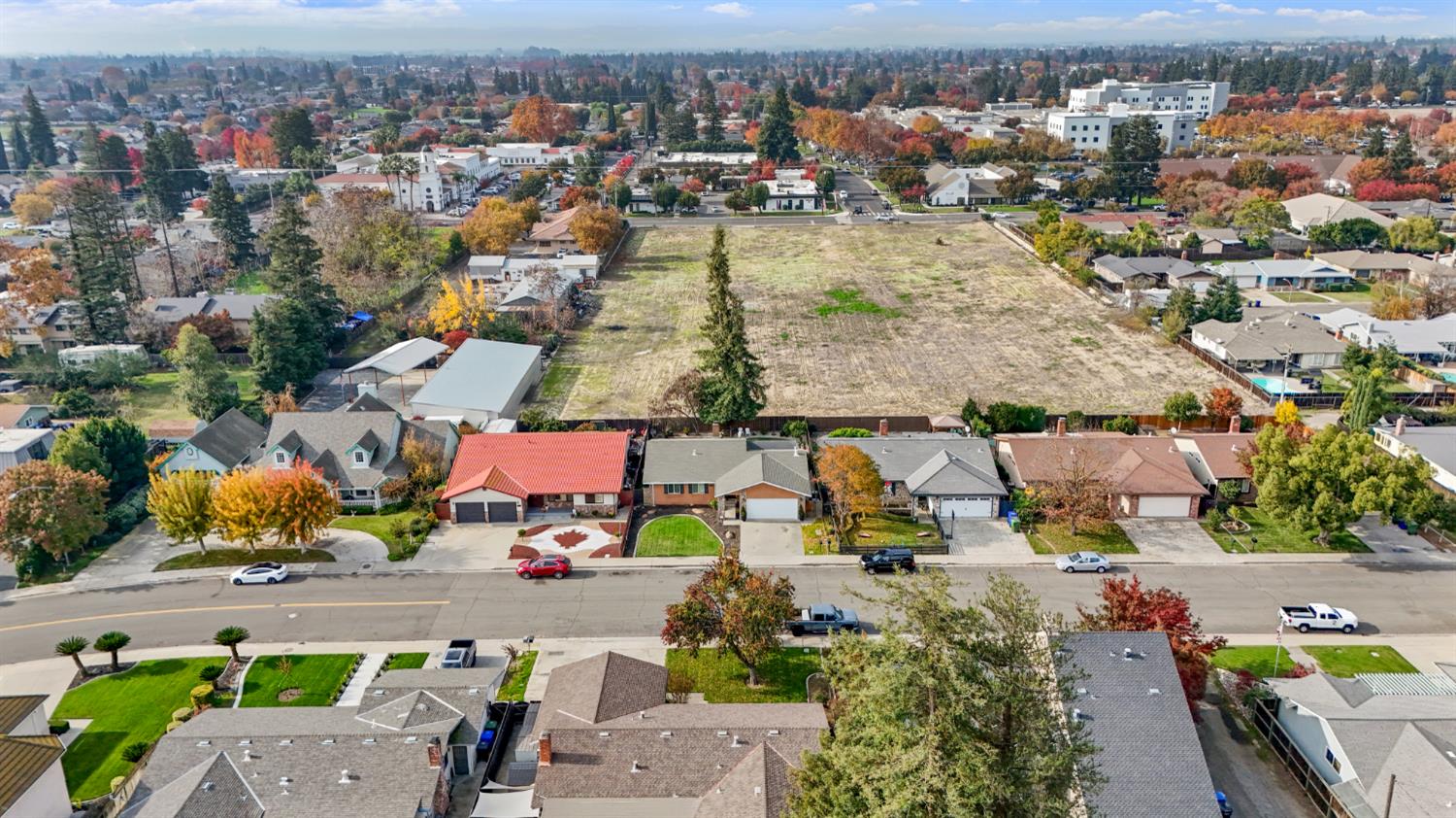 1921 Carleton Drive Turlock, CA 95382 - Photo 25 of 26 an aerial view of a city with lots of residential buildings ocean and mountain view in back