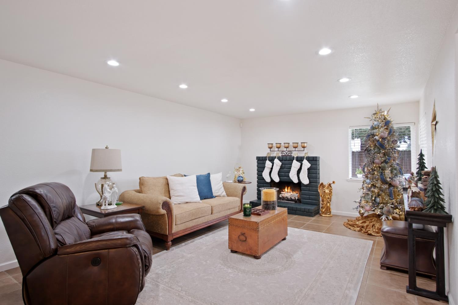 1921 Carleton Drive Turlock, CA 95382 - Photo 9 of 26 a living room with furniture and flowers