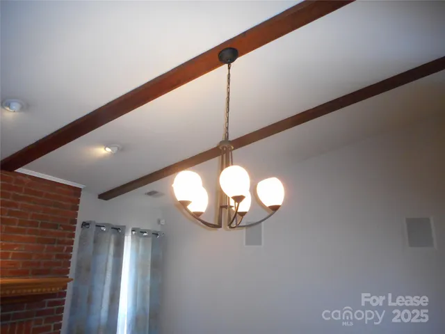 a close view of kitchen cabinet and window