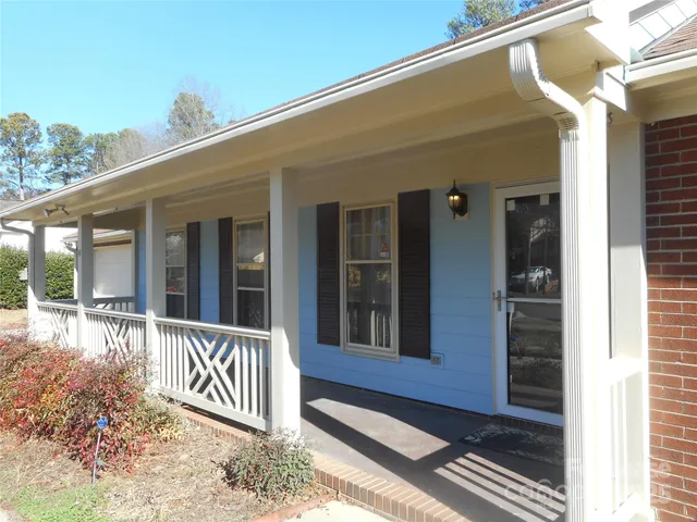 a front view of a house with a porch