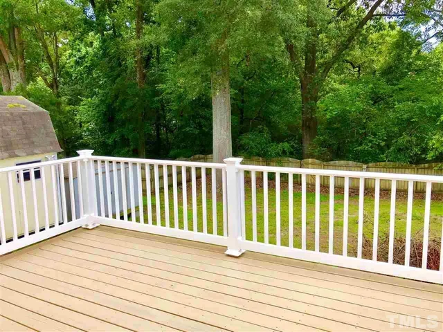 a view of a wooden roof deck