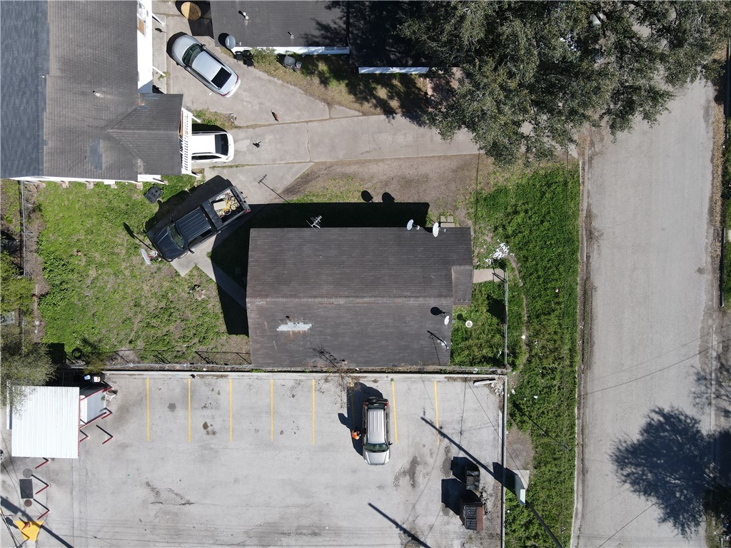 409 Chaparral Street Alice, TX 78332 - Photo 19 of 24 an aerial view of residential houses with outdoor space