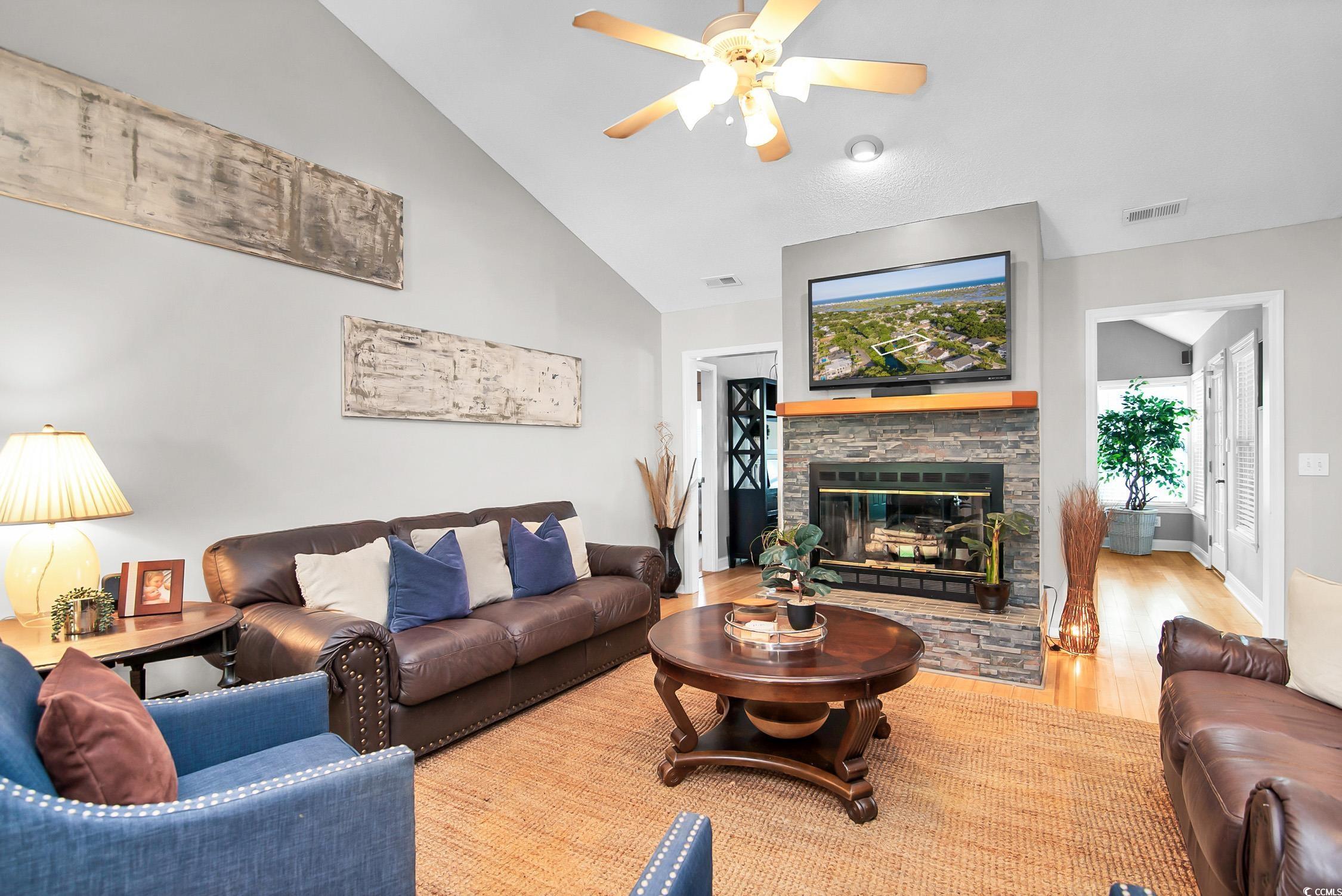 174 Edward Avenue Murrells Inlet, SC 29576 - Photo 8 of 39 Living room featuring a ceiling fan, wood finished
