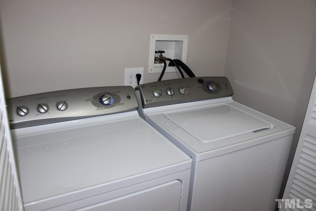 462 Pixley Pritchard Road Timberlake, NC 27583 - Photo 15 of 25 a utility room with dryer and washer