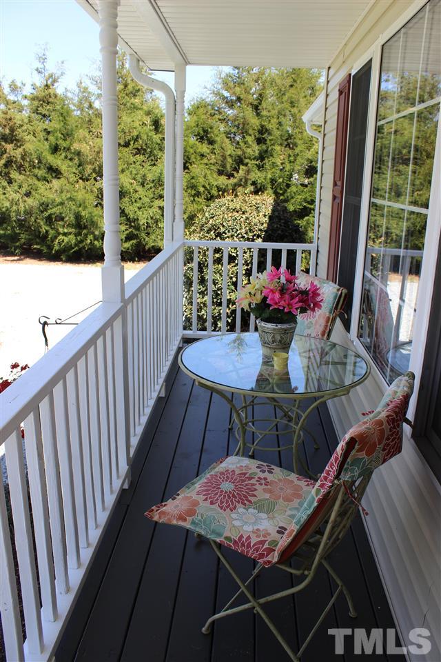 462 Pixley Pritchard Road Timberlake, NC 27583 - Photo 17 of 25 a view of a dining room with furniture window and outside view