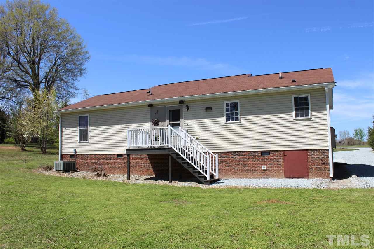 462 Pixley Pritchard Road Timberlake, NC 27583 - Photo 20 of 25 a view of a house with a backyard