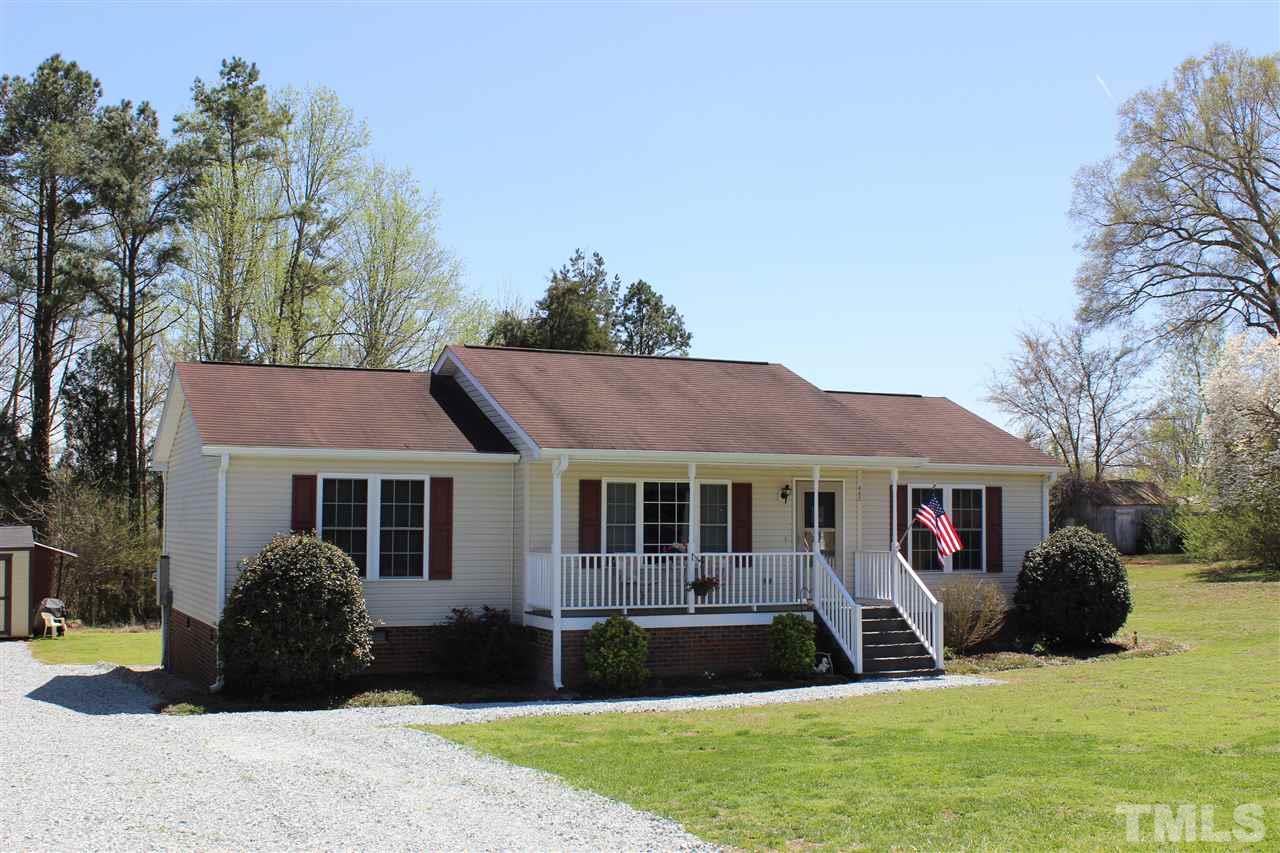 462 Pixley Pritchard Road Timberlake, NC 27583 - Photo 21 of 25 a front view of house with yard and green space