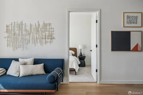 a bedroom with furniture and a couch