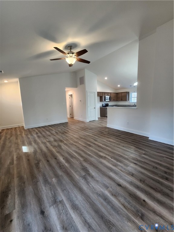 339 Midway Lane Aylett, VA 23009 - Photo 4 of 31 a view of a livingroom with a ceiling fan wooden floor and window